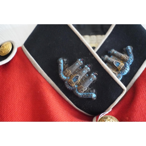 1745 - British army uniform, a red doublet jacket with Hawkes and Co of London label, having Hawkes and Co ... 