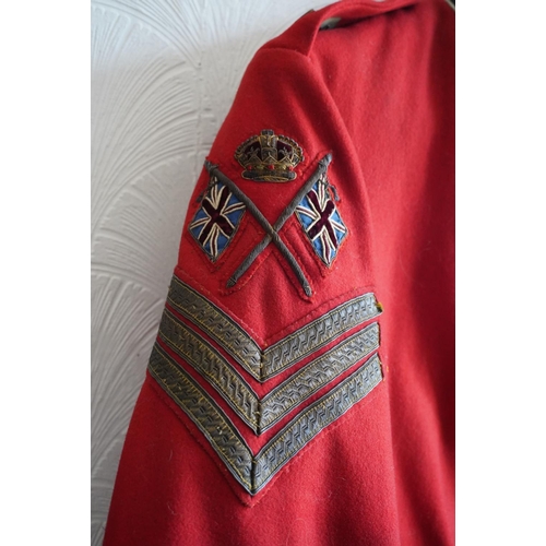 1746 - British army uniform, a red doublet jacket having medal ribbons for Territorial efficiency medal and... 