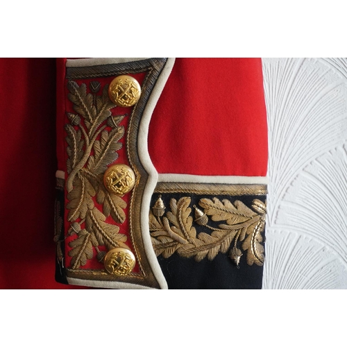 1752 - British army uniform, a red tunic jacket with brass buttons, bullion wire knot epaulette with insign... 