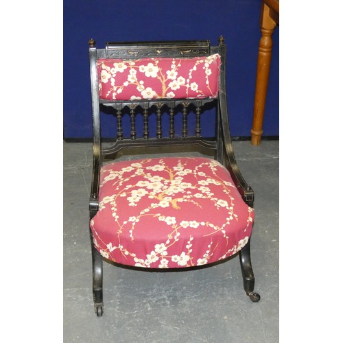 195 - Victorian ebonised nursing chair.