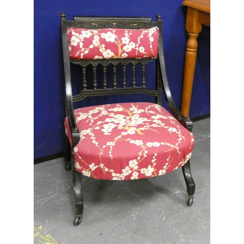 195 - Victorian ebonised nursing chair.