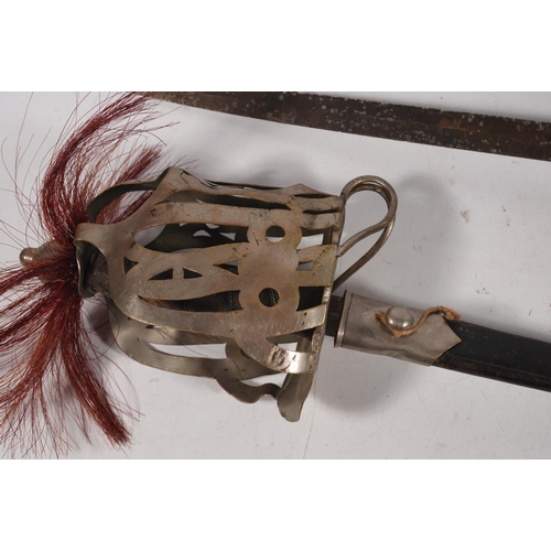 1699 - Pair of children's size swords modelled on a Scottish basket hilted broadsword, blade length 38cm, s... 