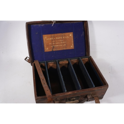 1763 - Brown leather clad cartridge case with sectional interior bearing label 'Army & Navy CSL Gun Dep... 