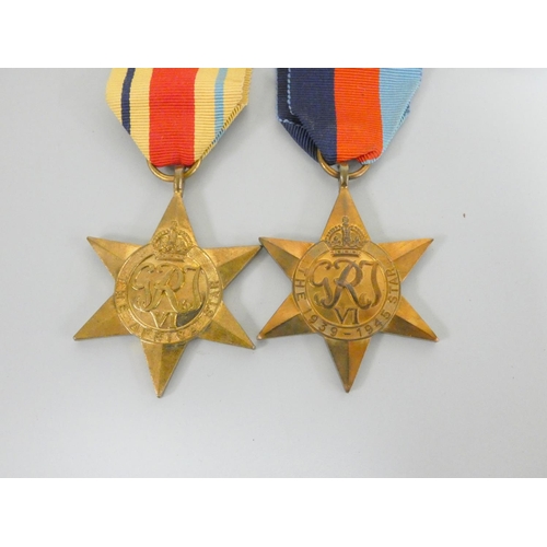 315 - WW2 British medal group comprising of a Defence Medal, 1939-45 Medal, 1939-45 Star and Africa Star, ... 