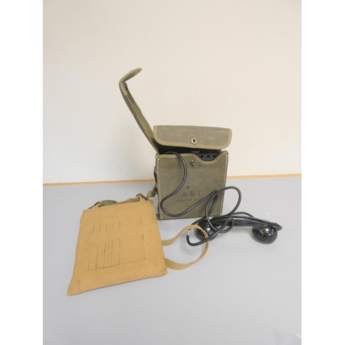 328 - WW2 era U.S EE-8 field telephone in olive drape canvas case, the receiver dated 1943, also a WW2 kha... 