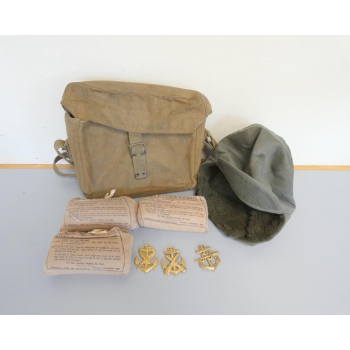 329 - Militaria to include three 1944 shell dressing packages from Robinson & Sons, a Khaki haver... 