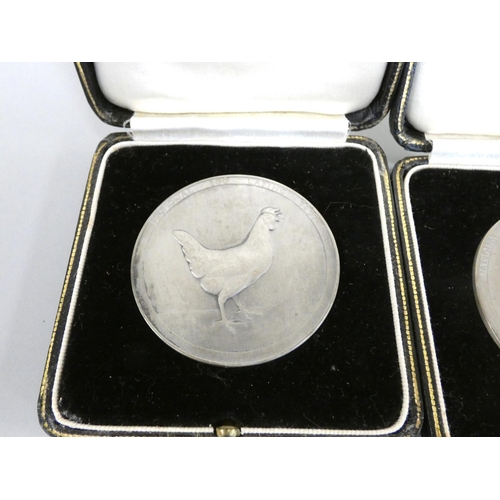 337 - Two National Egg Laying Test sterling silver medals by Elkington & Co, Birmingham 1939 in origin... 