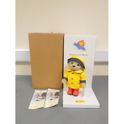 75 - Steiff. Paddington Bear, 2005, white tag 354311, in blond mohair, with trademark raincoat and Wellin... 