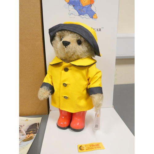 75 - Steiff. Paddington Bear, 2005, white tag 354311, in blond mohair, with trademark raincoat and Wellin... 