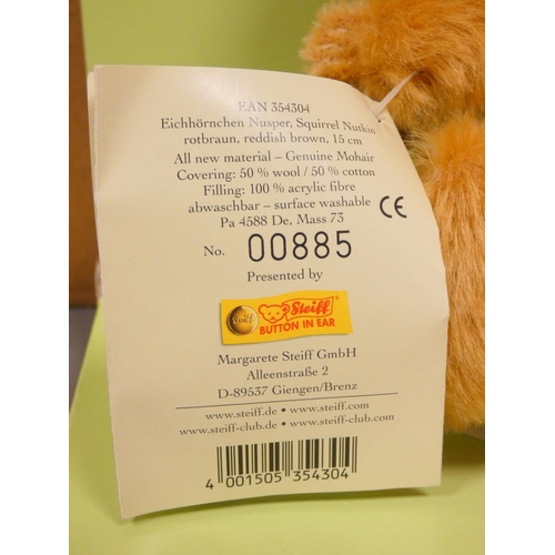 84 - Steiff. Squirrel Nutkin, 2004, white tag 354304, in reddish brown mohair. Complete with swing certif... 