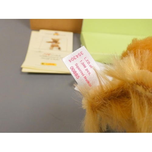 84 - Steiff. Squirrel Nutkin, 2004, white tag 354304, in reddish brown mohair. Complete with swing certif... 