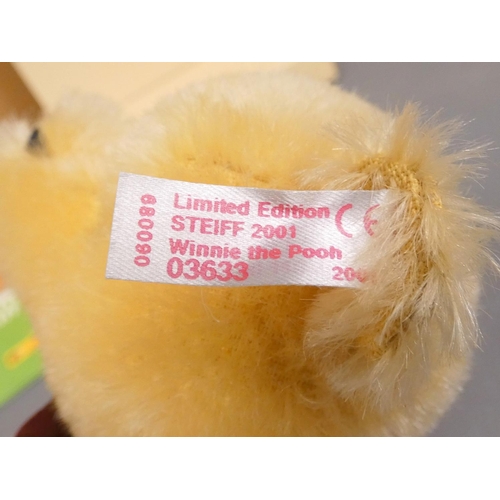 88 - Steiff. Winnie the Pooh, 2001, white tag 680090, in blond mohair with waistcoat. Complete with swing... 