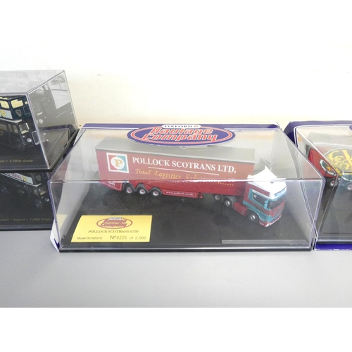 134 - Oxford Diecast. A group of 1:76 scale boxed models behind plexiglass cases to include 