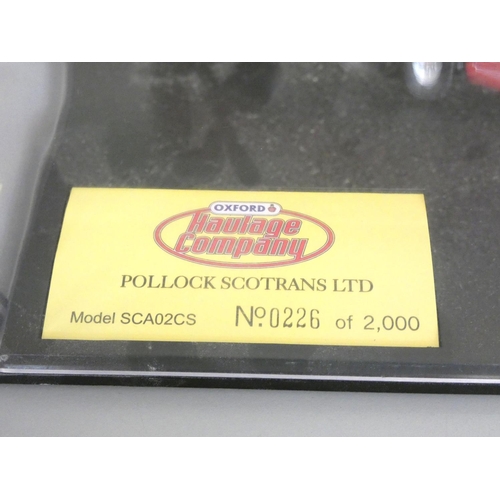 134 - Oxford Diecast. A group of 1:76 scale boxed models behind plexiglass cases to include 