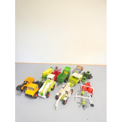 143 - Siku. Box of die-cast model tractors and farm implements to include a Claas Jaguar 695 3854, a  Claa... 