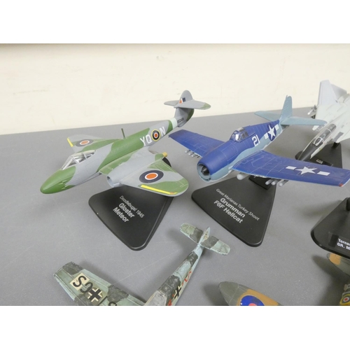 102 - Atlas Editions. Box of loose model aircraft many with stands to include a Supermarine Spitfire MKI, ... 