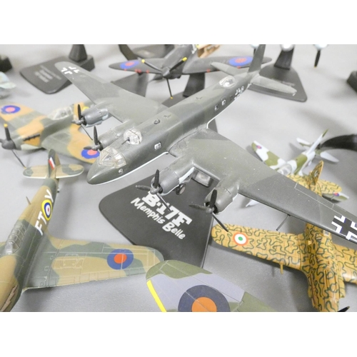 102 - Atlas Editions. Box of loose model aircraft many with stands to include a Supermarine Spitfire MKI, ... 