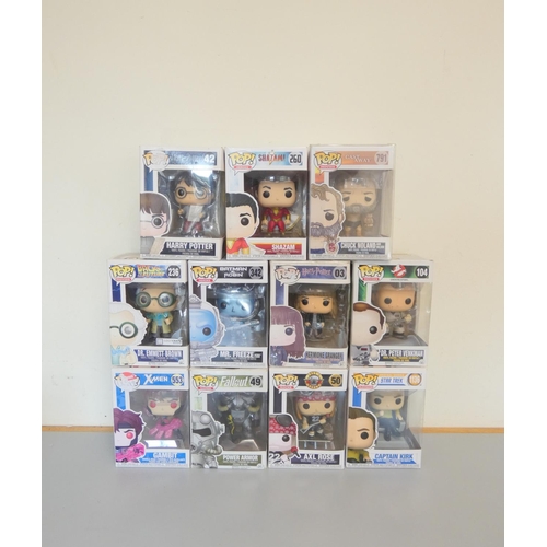 149 - Group of Funko Pop bobblehead figures to include Harry Potter 42, Shazam 260, Axl Rose 50, and other... 