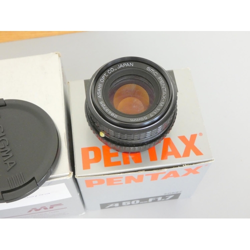 387 - Pentax LX boxed SLR camera with 50mm F1.7 lens, along with a Sigma 28-70mm F2.8 lens and a Pentax 50... 