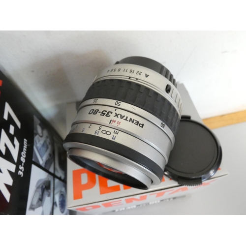 388 - Pentax MZ-7 SLR camera along with a Tokina SZ-X 630 60-300mm lens, Hoya filters, Sony DCR-HC19E camc... 