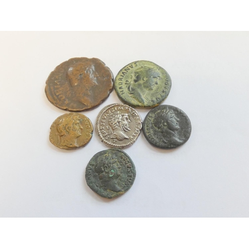 245 - Roman Imperial Coinage. Coin group comprising of a silver denarius of Septimus Severus, a Semis of H... 