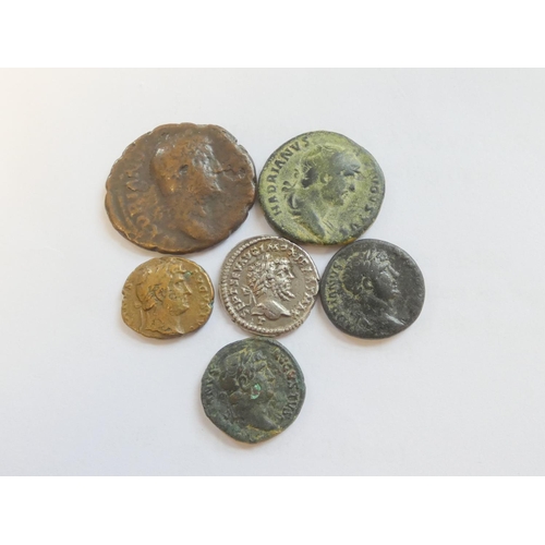 245 - Roman Imperial Coinage. Coin group comprising of a silver denarius of Septimus Severus, a Semis of H... 