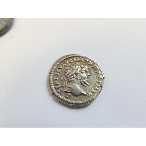 245 - Roman Imperial Coinage. Coin group comprising of a silver denarius of Septimus Severus, a Semis of H... 