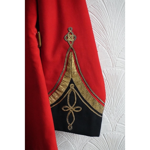 1751 - British army uniform, a red tunic jacket having The Queens Royal West Surrey Regiment brass buttons,... 