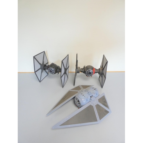 175 - Star Wars. Three model starfighters to include a Tie Striker Hasbro 2016, First Order Special Forces... 