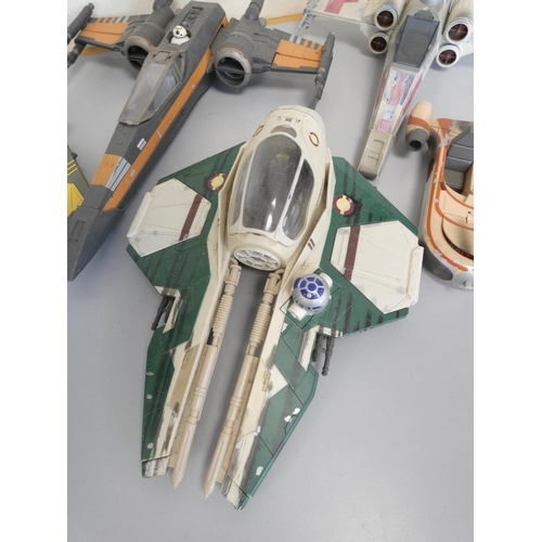 176 - Star Wars. Five model starfighters to include X-Wing, Poe Dameron's T-70 X-Wing, Obi Wan Kenobi Inte... 