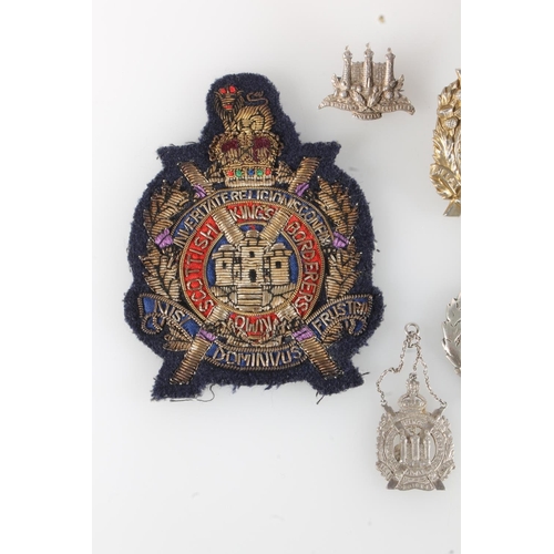 1636 - Kings Own Scottish Borderers insignia to include a XXV Kings Own Borderers badge 5cm tall, bullion w... 