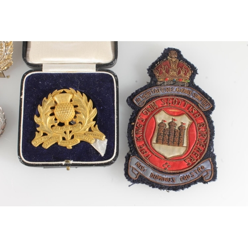 1636 - Kings Own Scottish Borderers insignia to include a XXV Kings Own Borderers badge 5cm tall, bullion w... 