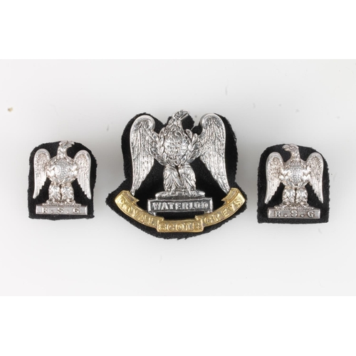 1653 - Unhallmarked white metal Royal Scots Greys cap badge by Joseph Jennens & Co, 4.5cm tall and two ... 