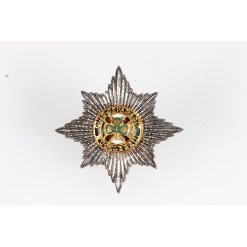 1657 - Fine diecast unhallmarked white metal and enamel Irish Guards cap star, 4.3cm tall, 15g. Provenance:... 