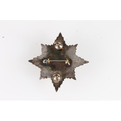 1657 - Fine diecast unhallmarked white metal and enamel Irish Guards cap star, 4.3cm tall, 15g. Provenance:... 