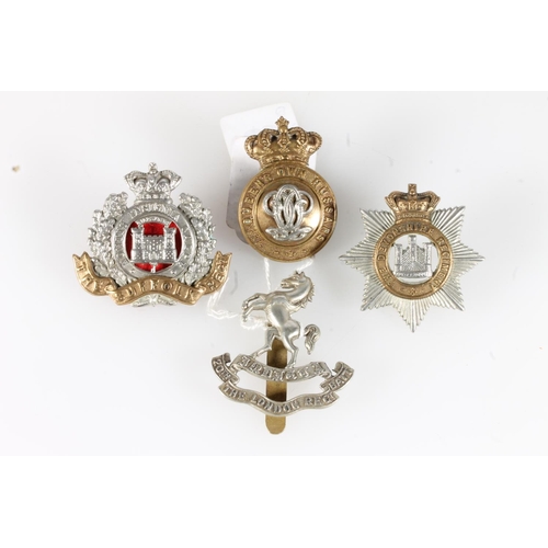 1660 - White metal cap badge of the Suffolk Regiment. Provenance: Bosleys Lot 60 30th July 2008. Brass cap ... 