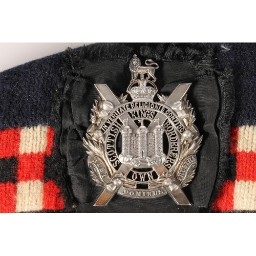 1758 - Unhallmarked diecast fretted white metal Kings Own Scottish Borderers cap badge on Glengarry cap wit... 