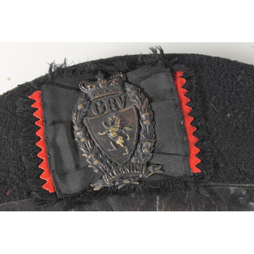 1760 - Galloway Rifle Volunteers blackened metal cap badge with Queens crown on a black cloth glengarry sid... 