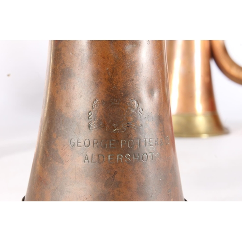 1768 - Two copper and brass bugles to include makers George Potter and Co of Aldershot and John Grey of Lon... 