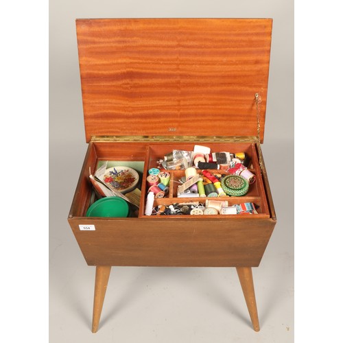 554 - Sewing box containing assorted thread, buttons, etc 