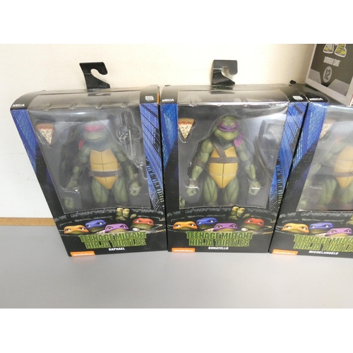 189 - Group of boxed figures to include Teenage Mutant Ninja Turtles by Neca, Gremlins Ultimate Stripe als... 