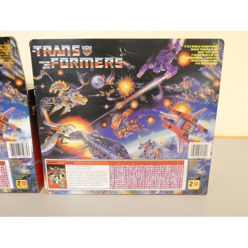 191 - Transformers. Two boxed vintage 1980s (1984) Hasbro Transformers figures to Dinobot Bombardier Swoop... 