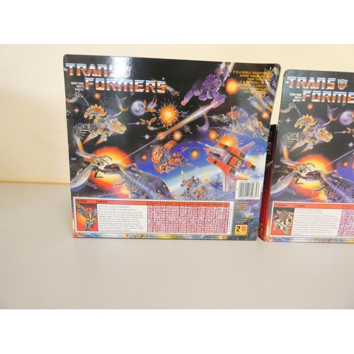 191 - Transformers. Two boxed vintage 1980s (1984) Hasbro Transformers figures to Dinobot Bombardier Swoop... 