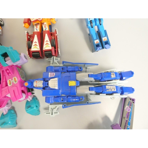 193 - Transformers. A large collection of 1980s Transformers figures by Hasbro / Takara Co Ltd. To include... 