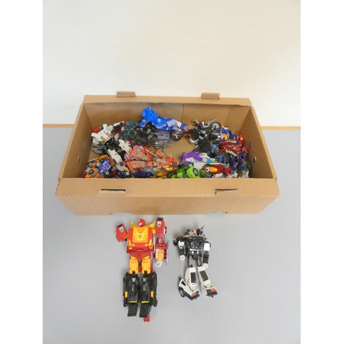 194 - Transformers. Box of contemporary figures to include Masterpiece, Rodimus Prime, and others. ... 