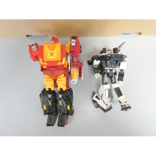 194 - Transformers. Box of contemporary figures to include Masterpiece, Rodimus Prime, and others. ... 