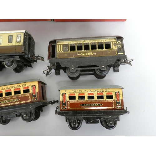 215 - Hornby. Tinplate models to include three boxed 0 gauge No.1 Cattle Trucks, a No.2 LNER black tank lo... 