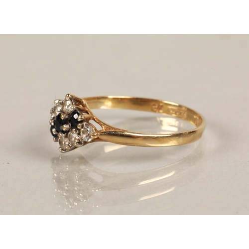 57 - 9ct gold ring set with a cluster of white and blue gems, ring size P, 1.6g