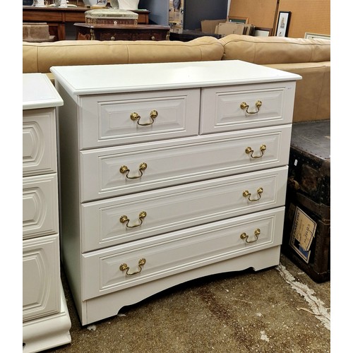 545 - Two over three chest of white veneered drawers