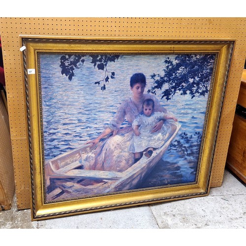 587 - E C Tarbell, Mother and Child in a Boat, polaroid museum replica print in gilt frame